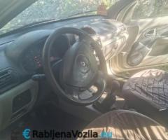 Dva auta Renault Thalia 1.5 dCi + 8 dodatnih guma - 11